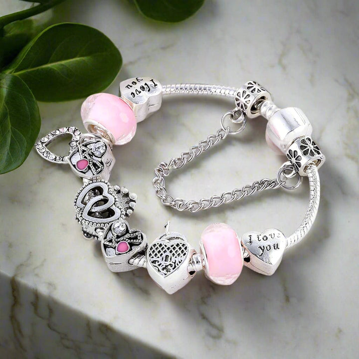 Silver Charm Bracelet with Heart and Pink Beads bracelet by Unique Leather Bracelets